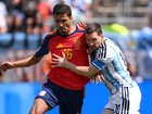 Rodri and Lionel Messi do battle.