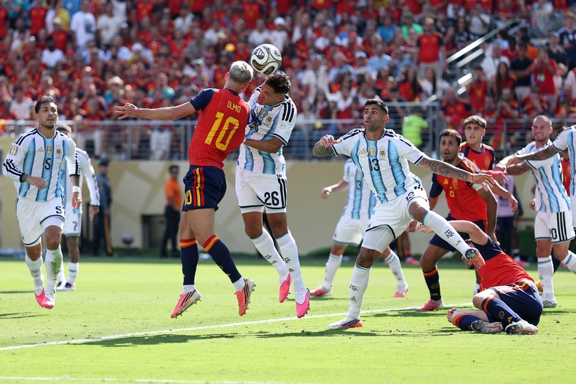 EAST RUTHERFORD, NEW JERSEY - JULY 19: Dani Olmo #10 of Spain competes for a header against Nahuel Molina #26 of Argentina during the FIFA World Cup 2026 Final match between Spain and Argentina at New York New Jersey Stadium on July 19, 2026 in East Rutherford, New Jersey. (Photo by Justin Setterfield/Getty Images)