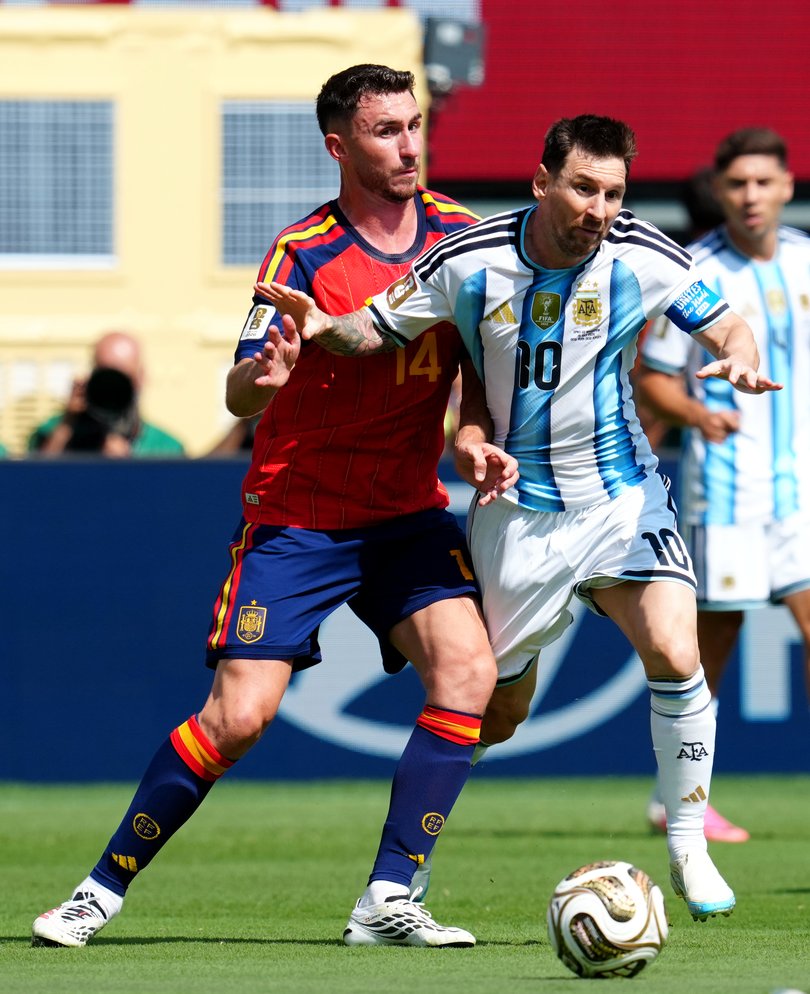 Argentina's Lionel Messi (right) battle for the ball with Spain’s Aymeric Laporte during the FIFA World Cup 2026 final at the New York-New Jersey Stadium. Picture date: Sunday July 19, 2026.. Photo credit should read: Nick Potts/PA Wire. RESTRICTIONS: Use subject to restrictions. Editorial use only, no commercial use without prior consent from rights holder.