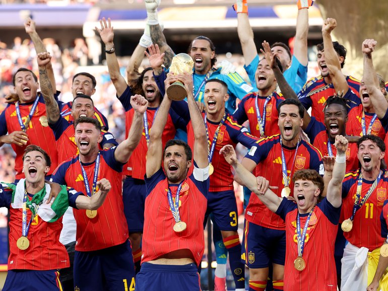 Spain celebrate their win.