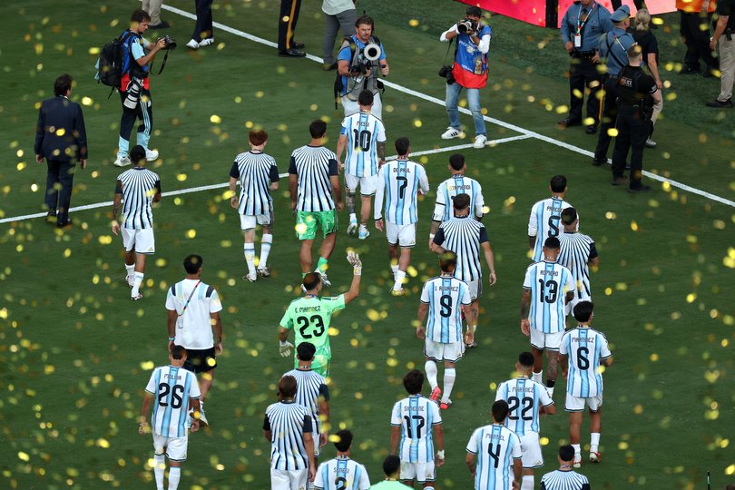 Argentina walk off the pitch after the trophy ceremony.