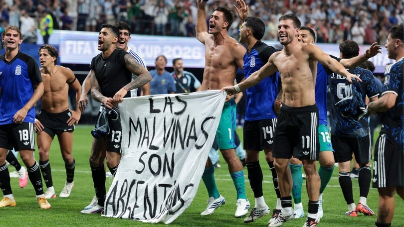 Argentina players celebrated their win over England with a Falkland Islands banner.