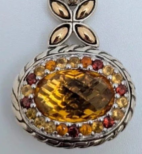 Sally Grace Contarino's family say she often wore a pendant, similar to the one pictured, on a silver chain.