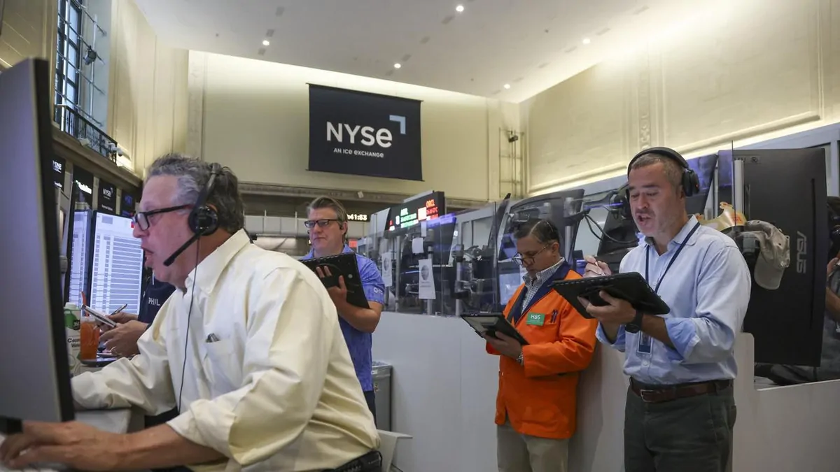Wall Street falls as Nasdaq, S&P 500 slide on chip stock sell-off despite strong US earnings