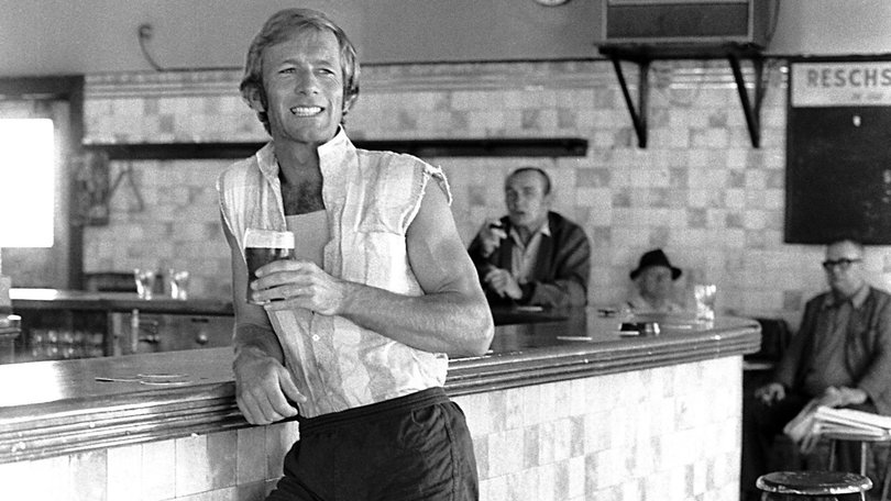 An easy-going Paul Hogan having a drink  and a smoke after work at the local is a relic of the past.
