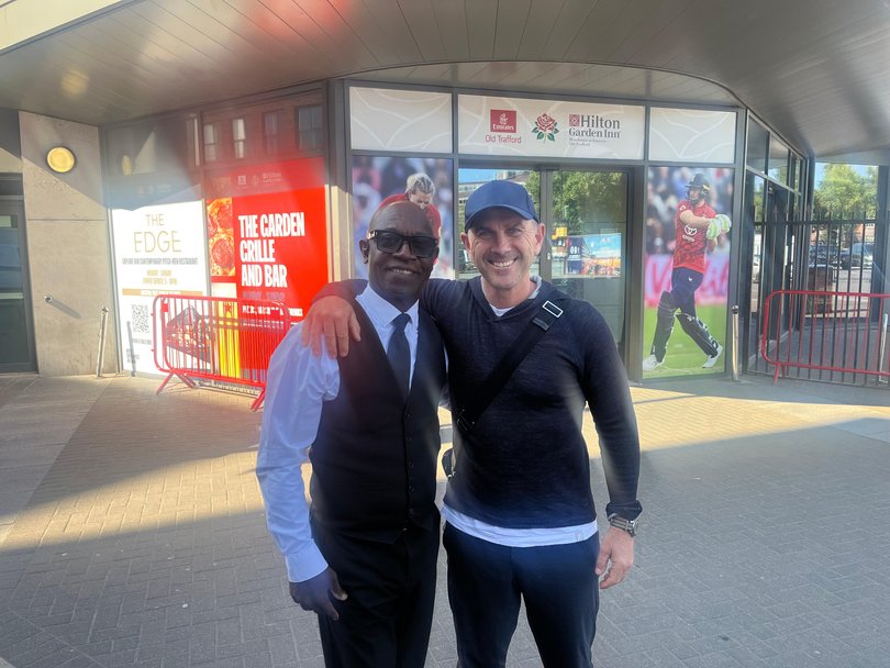 Justin Langer in England with Pastor George. 