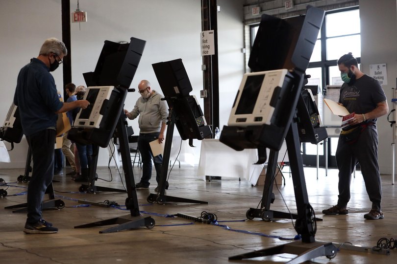 Washington DC voters cast their ballots on voting machines in October 2020.