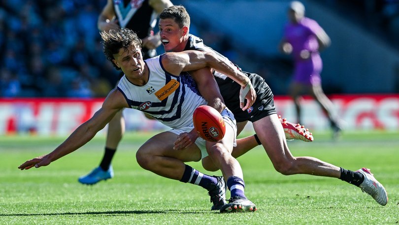 Neil Erasmus is tackled