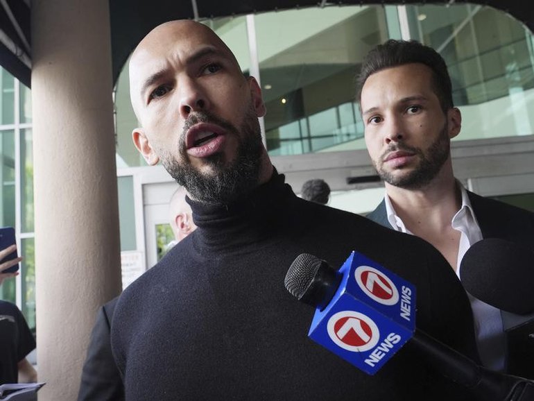 Influencer brothers Andrew and Tristan Tate have been arrested in the US. (AP PHOTO)