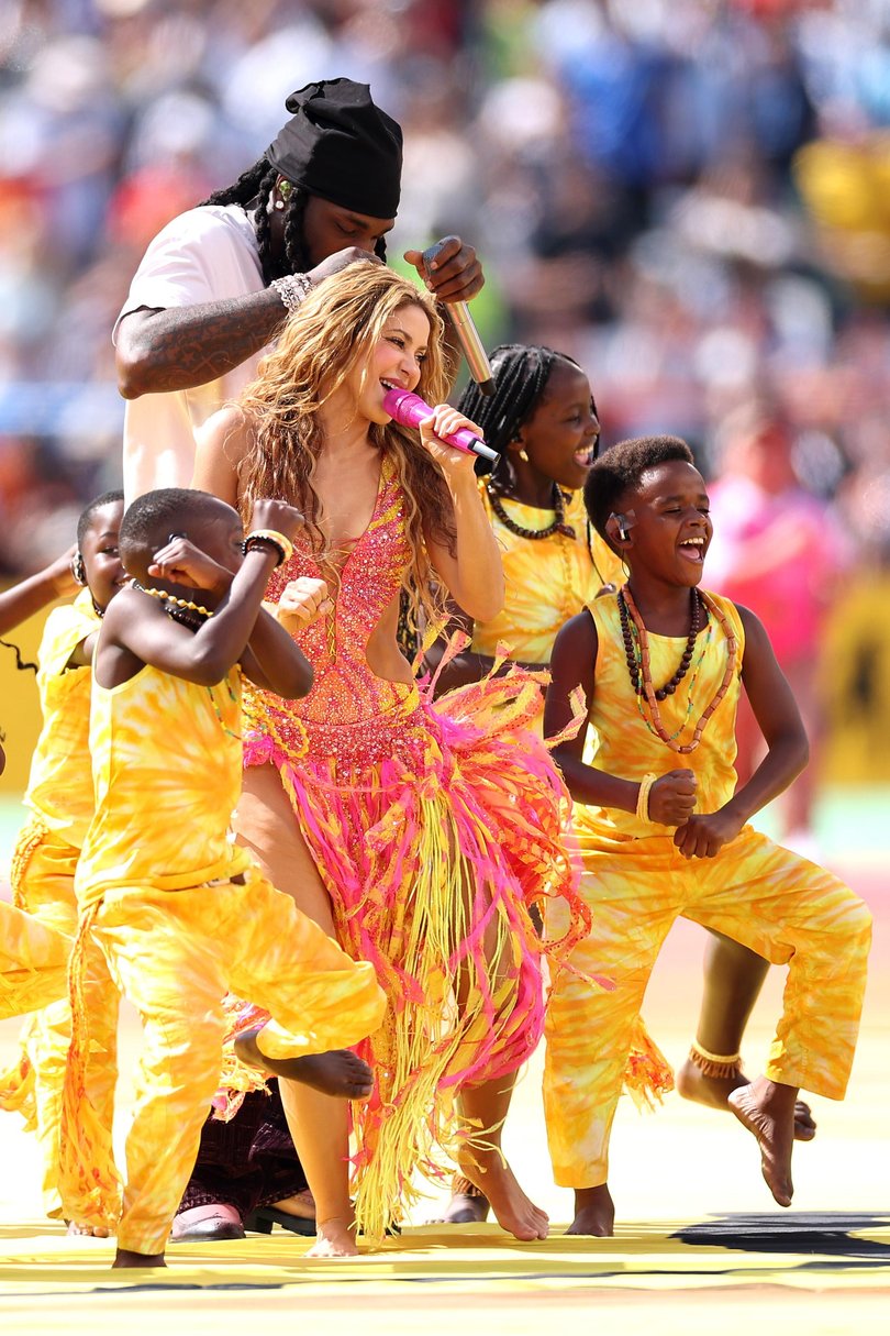 Shakira and Burna Boy perform during the Topps Final Halftime Show at the World Cup final.