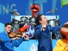 Gustavo Dudamel of the New York Philharmonic and Animal of The Muppets perform at the World Cup half-time show/ 