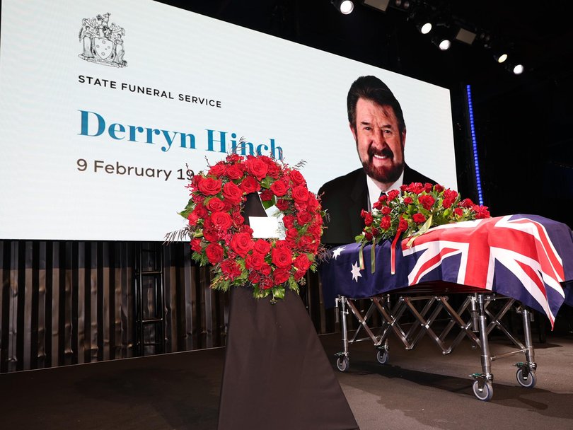 A state funeral is being held for Derryn Hinch at the Timber Yard in Port Melbourne.