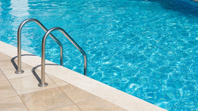 A five-year-old boy has been left fighting for his life after he was poisoned by chlorine while swimming in a public pool.