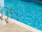 A five-year-old boy has been left fighting for his life after he was poisoned by chlorine while swimming in a public pool.