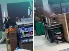 Chaos has erupted inside a Woolworths where a man is accused of harassing a woman and her children. 