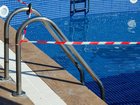 A young girl has died after her hair became stuck in a swimming pool pump while on holiday with her family in Italy.