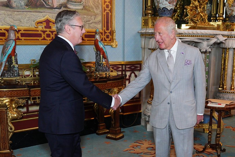 King Charles III welcomes outgoing Prime Minister Sir Keir Starmer, during an audience at Buckingham Palace.