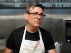  Andy Burnham chops mushrooms as he helps prepare breakfast during a visit to The Passage Homeless Charity. Later he became the UK's 59th Prime Minister, 