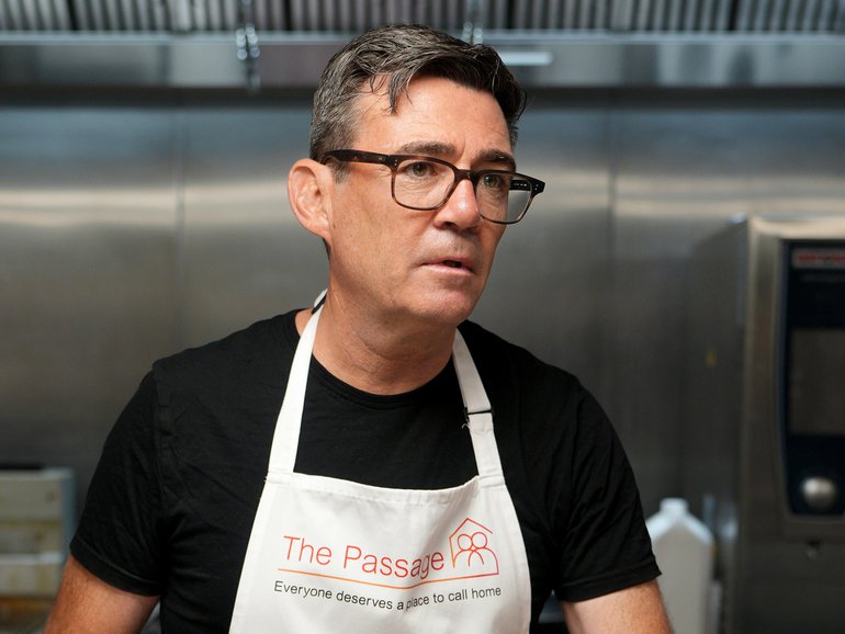  Andy Burnham chops mushrooms as he helps prepare breakfast during a visit to The Passage Homeless Charity. Later he became the UK's 59th Prime Minister, 