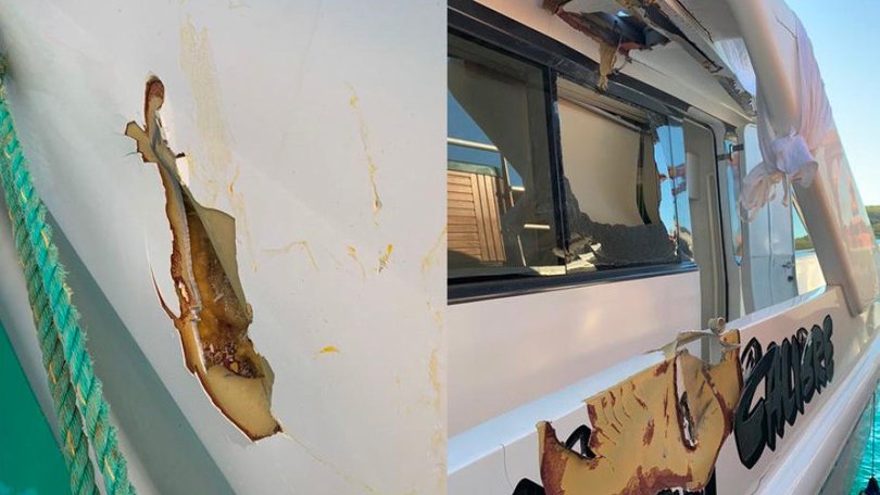 Damage to Troy Thomas's boat High Calibre caused by a helicopter crash involving his Robinson VH-ZGY .