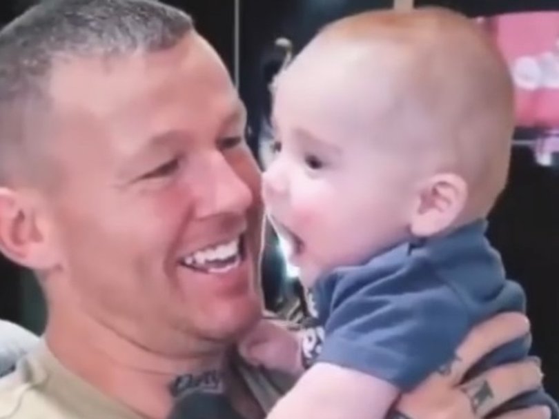 Todd Carney and son Lion, 2021.