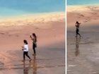 Two tourists have been filmed waking across the protected thermal area surrounding the largest hot spring in the US, prompting widespread criticism after footage of the act spread online.