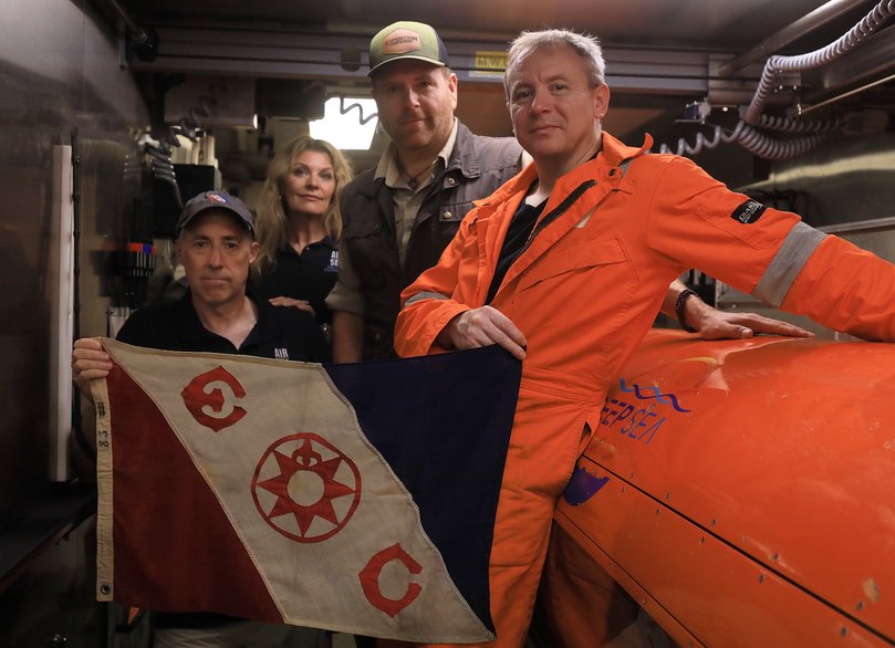 The team behind the discovery, following a nearly decade-long investigation.