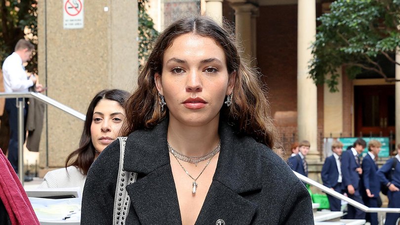 Actress Charlotte MacInnes outside the Federal Court during the trial. 