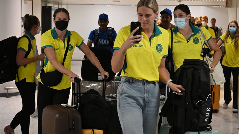 Shayna Jack, centre, arrives at at Glasgow International Airport ahead of the Commonwealth Games in Glasgow.