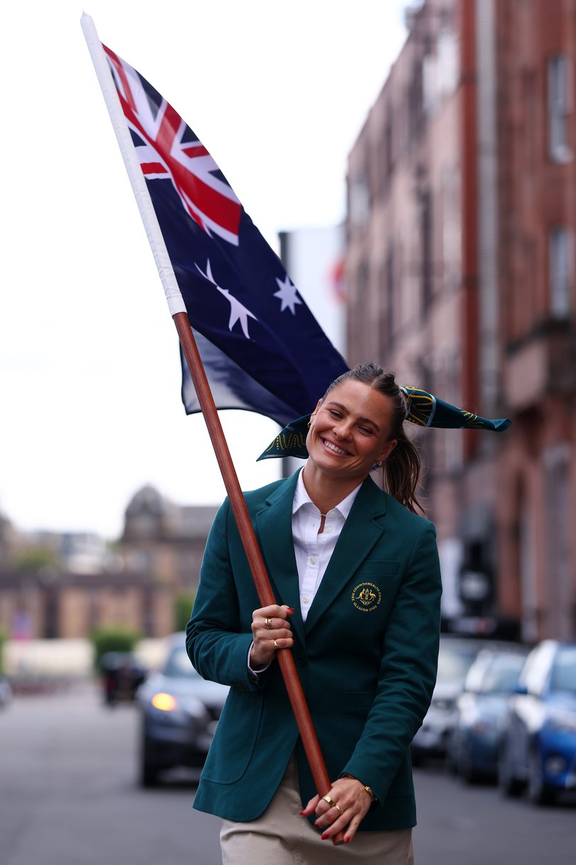 Kennedy with the Aussie flag.