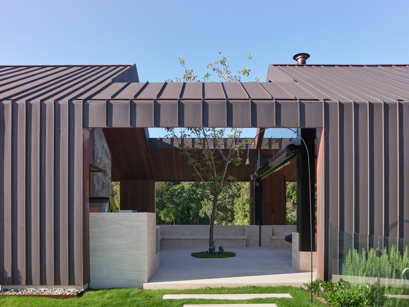The property boasts six bedrooms and six bathrooms, as well as a stables and a full-size tennis court.
