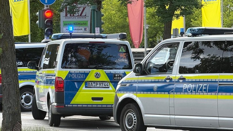 A knife-wielding 20-year-old who fatally attacked a man and appeared to hold others hostage in a bank in the southern German city of Regensburg has been detained, local media and police say.