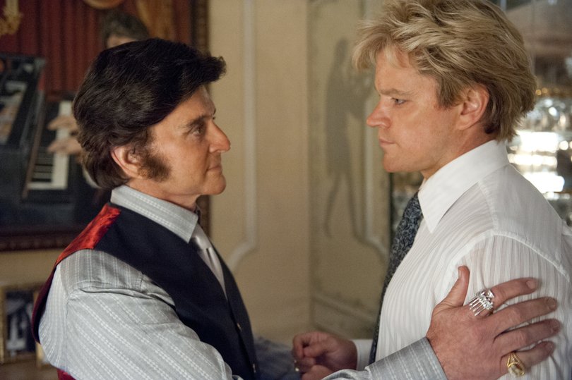 This film image released by HBO shows Michael Douglas, left, as Liberace, and Matt Damon, as Scott Thorson in a scene from "Behind the Candelabra," premiering Sunday at 9 p.m. EDT on HBO. (AP Photo/HBO, Claudette Barius)