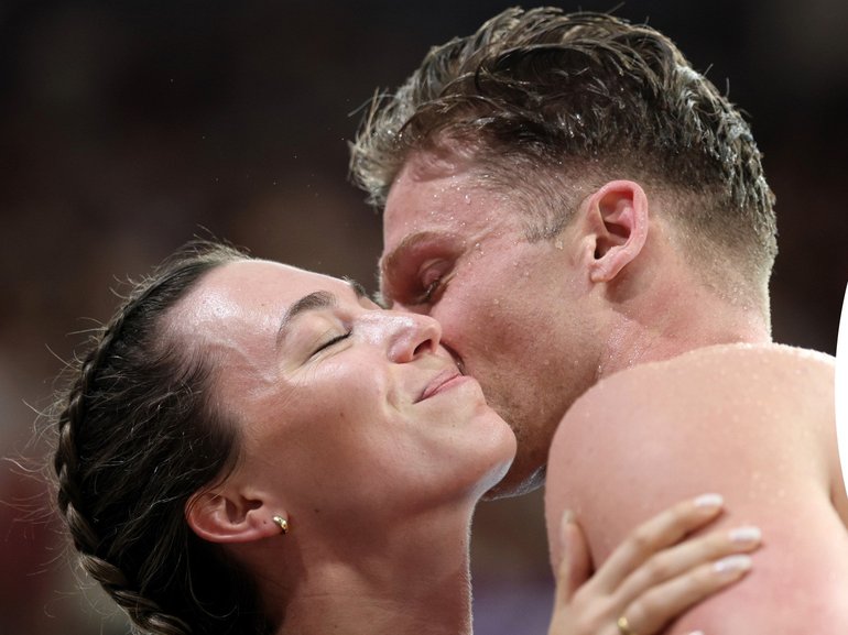 Sam Williamson of Team Australia celebrates with partner Linnea Lindberg after his triumph.