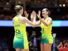 Kiera Austin and Sophie Garbin of Team Australia celebrate during the Netball Preliminary Pool A match between Team Australia and Team England
