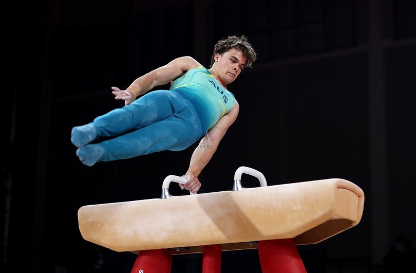 Competing on the pommel horse.