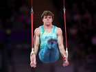 Jesse Moore is in medal contention in the all-around gymnastics.