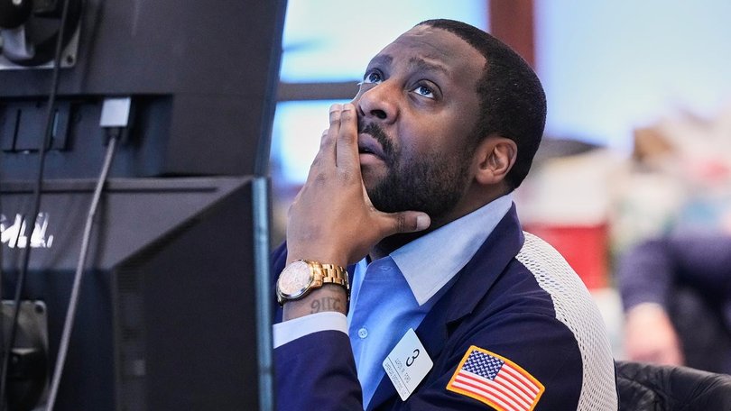 Wall St investors are weighing concerns over AI, the Mideast and tariffs, sending markets lower.