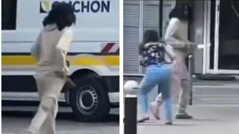 Footage from Paris shows an alleged knifeman appearing to lunge at a woman on the street.