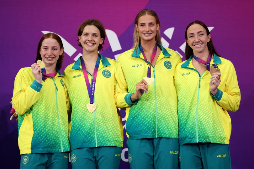 Mollie O’Callaghan (left) is competing at the Commonwealth Games while dealing with stress fractures in her back.