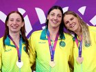 Gold medallist Meg Harris flanked by Mollie O'Callaghan and Shayna Jack during the medal ceremony for the women’s 100m freestyle.