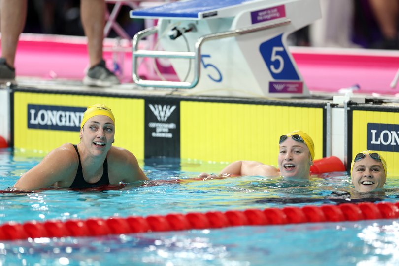 Meg Harris, Mollie O'Callaghan and Shayna Jack after their 100m freestyle clean sweep.
