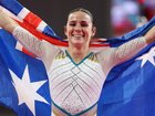 Kate McDonald beams after winning gold to earn redemption.