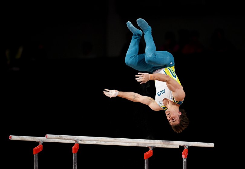 Jesse Moore of Team Australia competes in the Men's Parallel Bars Final.