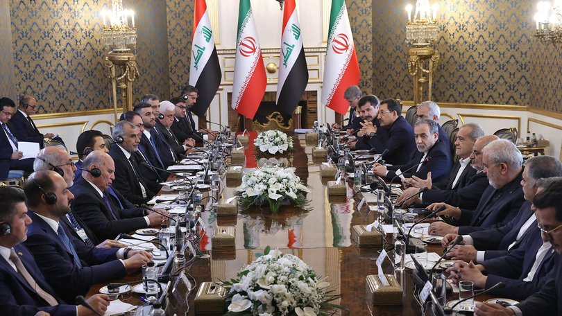 Iranian President Masoud Pezeshkian and his delegation (right) meets with Iraqi Prime Minister Ali al-Zaidi and his delegation (left) in Tehran.