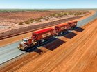 A MinRes truck on the upgraded Onslow Iron haul road.