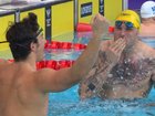 Kyle Chalmers (right) blows a kiss to fellow gold medallist Ben Armbruster after their epic dead heat.