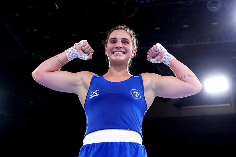GLASGOW, SCOTLAND - JULY 29: Lekeisha Pergoliti of Team Australia celebrates victory over Blessing Orakwe of Team Nigeria during the Women's 70kg Quarter-Final match on day six of the Glasgow 2026 Commonwealth Games at SEC Centre on July 29, 2026 in Glasgow, Scotland. (Photo by Lintao Zhang/Getty Images)