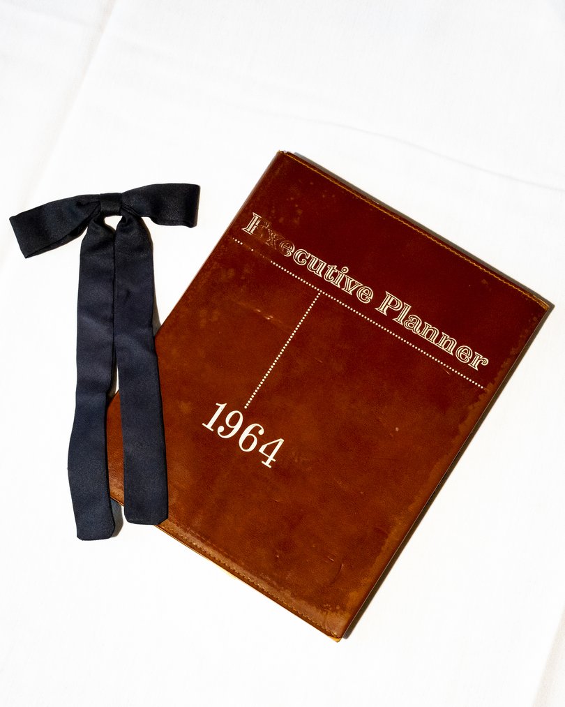 One of Harland Sanders’ signature ties and a planner in which he wrote out a version of the 11 herbs and spices he used to season his chicken.