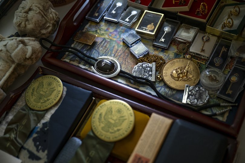 Dozens of awards and keys to various cities, which are part of Harland Sanders’ collection of artefacts up for auction.